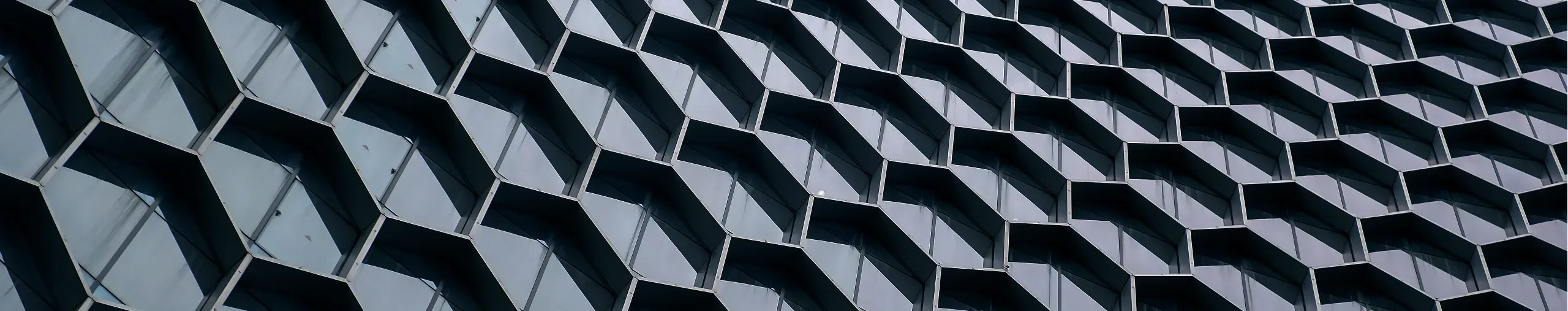 abstract-hexagonal-pattern-on-skyscraper-exterior_hero_medium